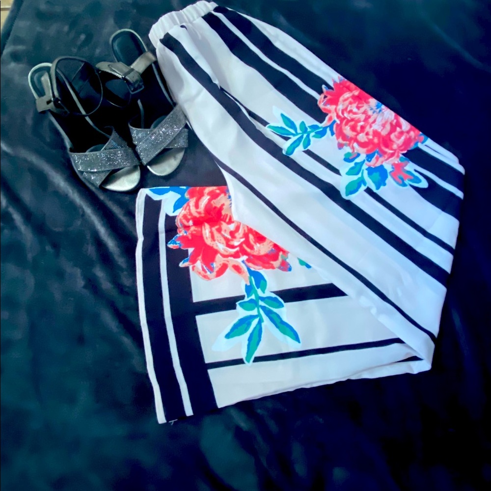 Wide leg pants with draw string. 100% polyester